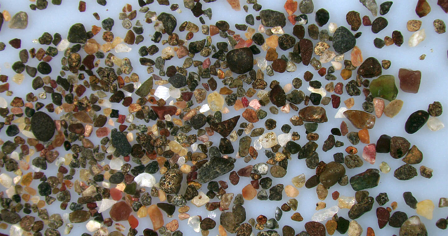Playa Camaronal Costa Rica Sand Grains Magnified Under Microscope Slider