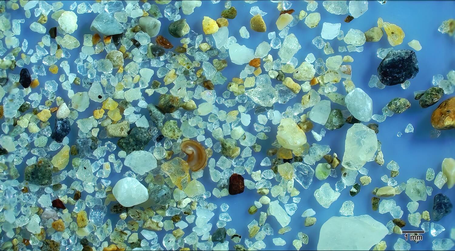Kuşadası Aydin Turkey Sand Grains Magnified Under Microscope Slider